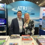 Joseph L. Soliz with a colleague at the American Transportation Research Institute (ATRI) booth