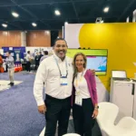 Joseph L. Soliz with a colleague at a traffic safety technology exhibit